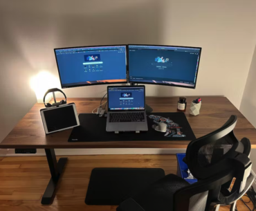 What do you guys think of my setup? 💻 I think I'm gonna add a third monitor and put my laptop on the side.