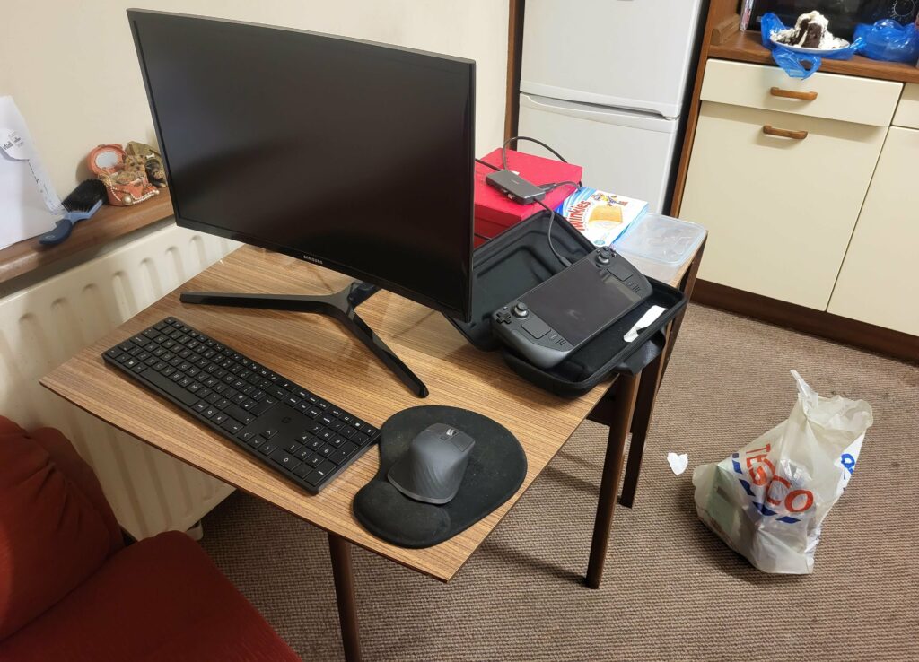 Armchair + 30+ year old kitchen table = serviceable workstation