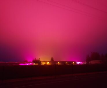 Rural cyberpunk: to compensate for the short winter days, ag corporations near my house are using grow lights that turn the skies pink for miles around.