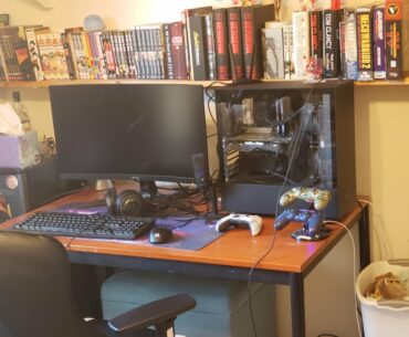 My average battlestations pc setup on the left and TV on the right