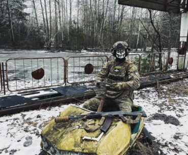 A Ukrainian Soldier on a Bumper Car in the Pripyat Amusement Park