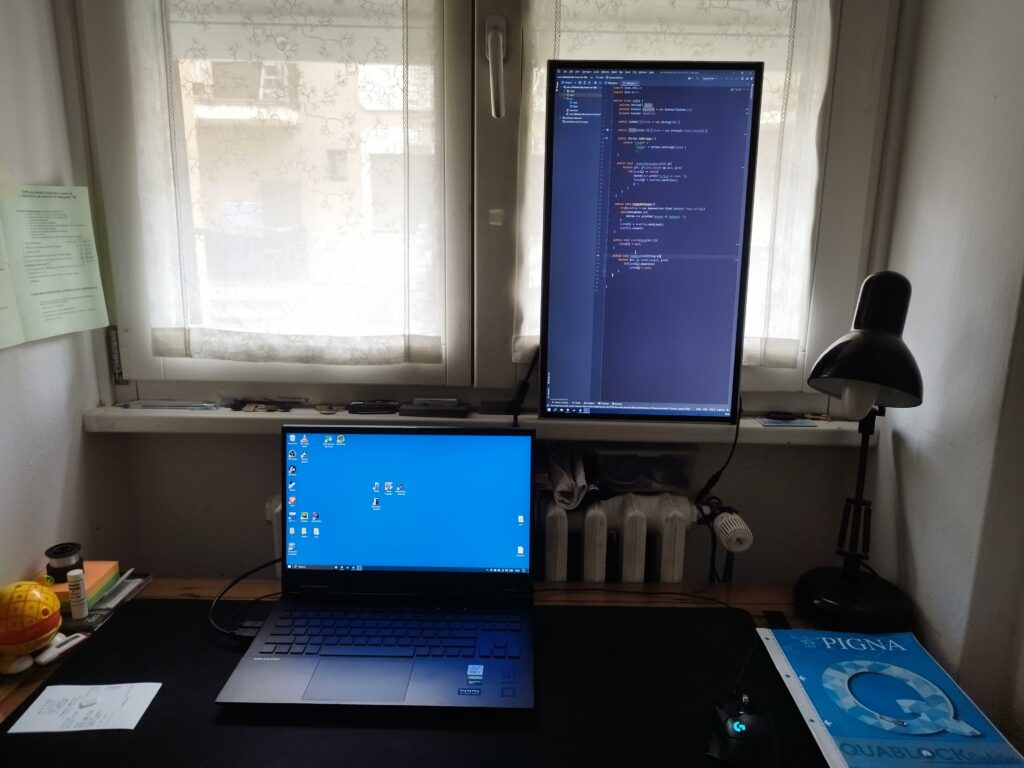 my shitty setup, for coding/streaming, no the vertical monitor isn't attached to anything, I will find a way to attach it