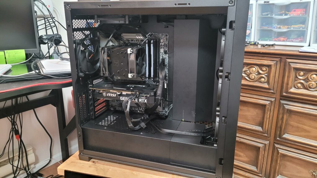 A few days ago, my PC went kaput. Found out the GPU was cooked. Baked, even. So, decided to buy some new parts, ditch the old Micro-ATX motherboard, and reuse the parts I got before.