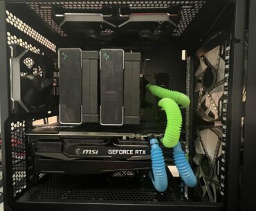 My built from a few months ago. Going towards an all black look, except the green & blue“tubes” which get bright under black light