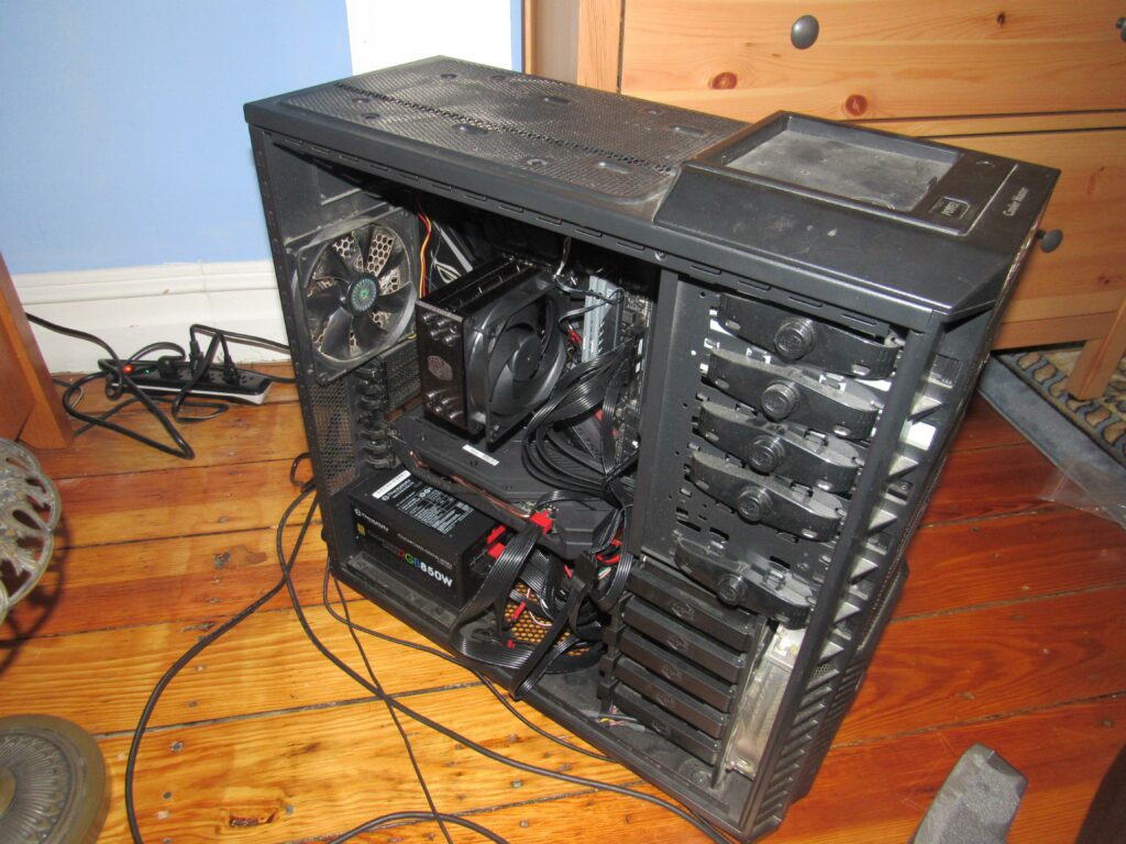Side view of the gaming pc Cooler Master case i've had since 2015 and pc components since Dec 2019 when this pic was taken. My brother originally got me the case with all asus hardware in July 28th 2015 and my friend Ryan updated it for me on Dec 6th 2019 (my brothers birthday coincidentally).