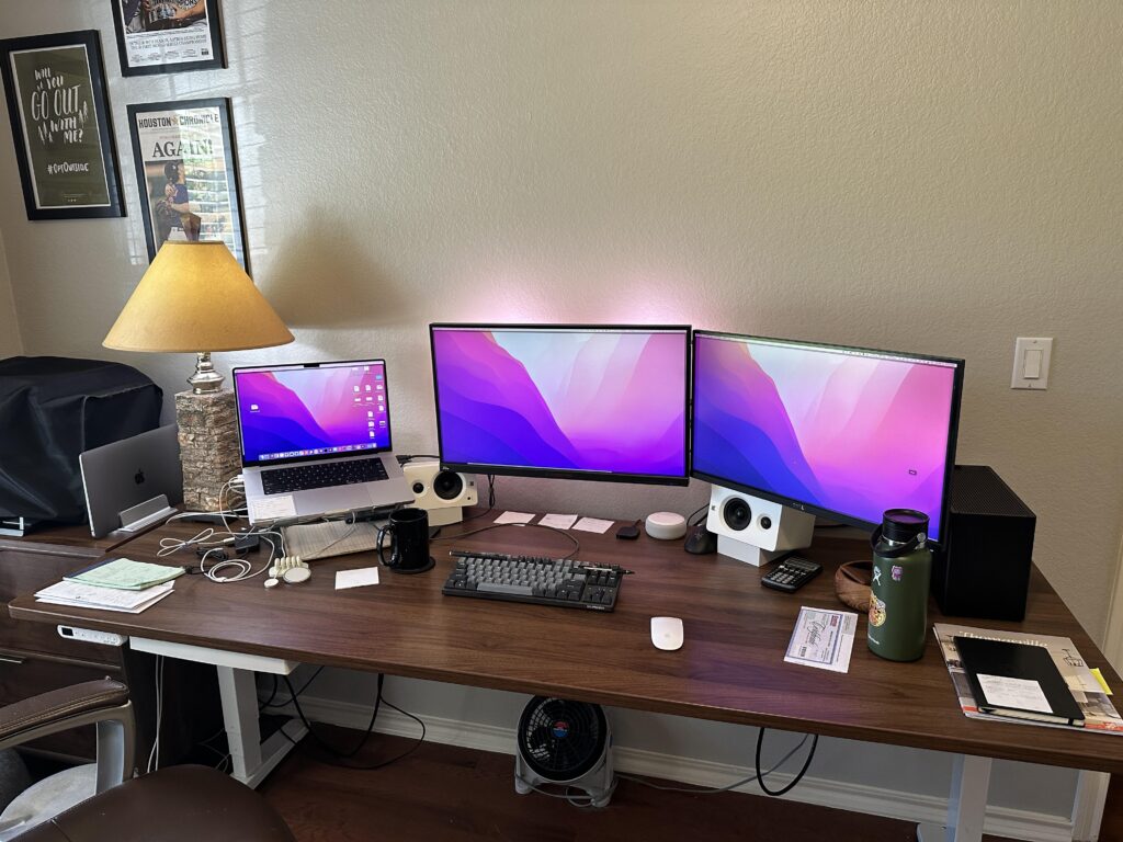 Professional and personal office desk setup