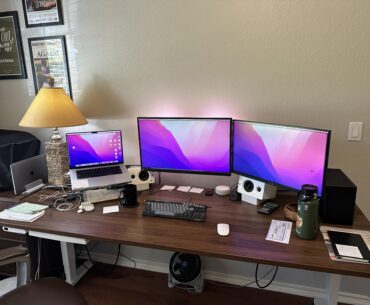 Professional and personal office desk setup