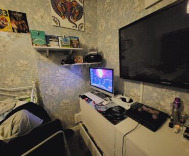 Here's my gaming set up. Would love a gaming chair, but would need a bigger bedroom