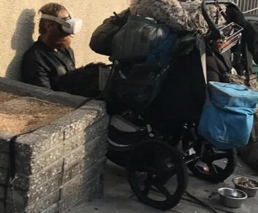 Homeless man in Silicon Valley with VR headset