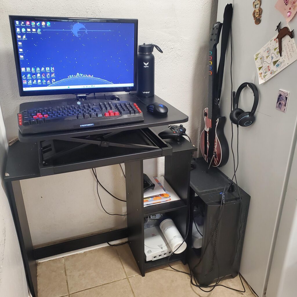 My shitty battlestation (I live in a 500 sq foot apartment with a partner and have to make do)