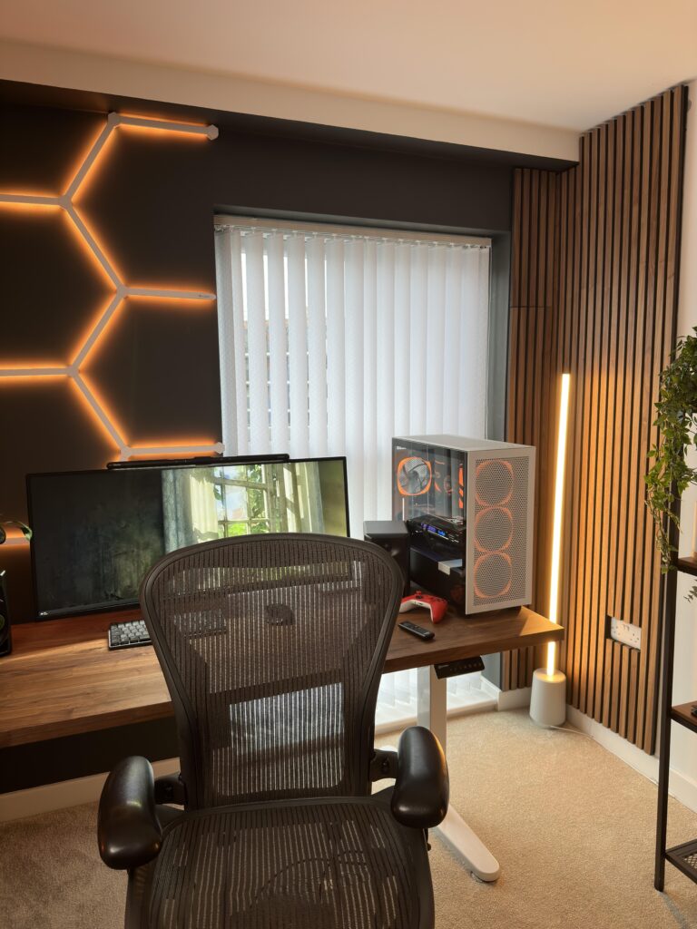 Two month progress. Installed the acoustic wall panels and Nanoleaf lines