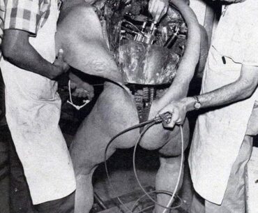 Disney technicians repairing an animatronic figure