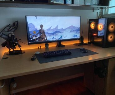 Pretty satisfied with my setup, but how can I hide the power extension/strip on the bottom left while still making it accessible