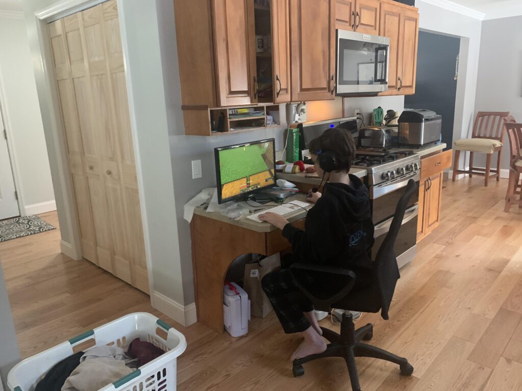 My brother playing Minecraft on a 2014 Mac mini in the kitchen. I think I’m gonna get him a real pc for his birthday.