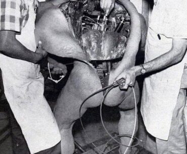 Disney technicians repairing an animatronic figure