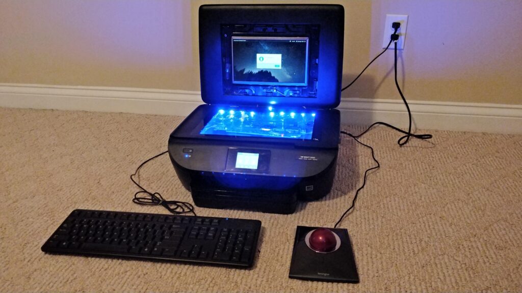 I put a laptop inside of a printer (again, but now it prints): The Comprinter II