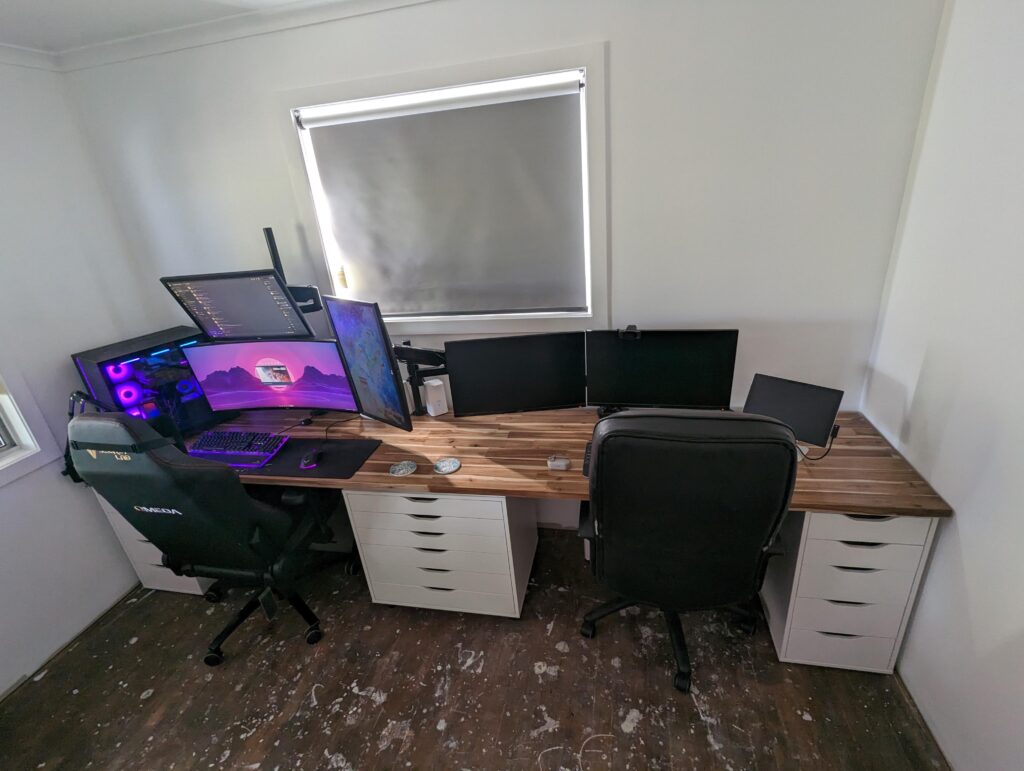 What do you reckon? My gaming rig and my wife's WFH setup