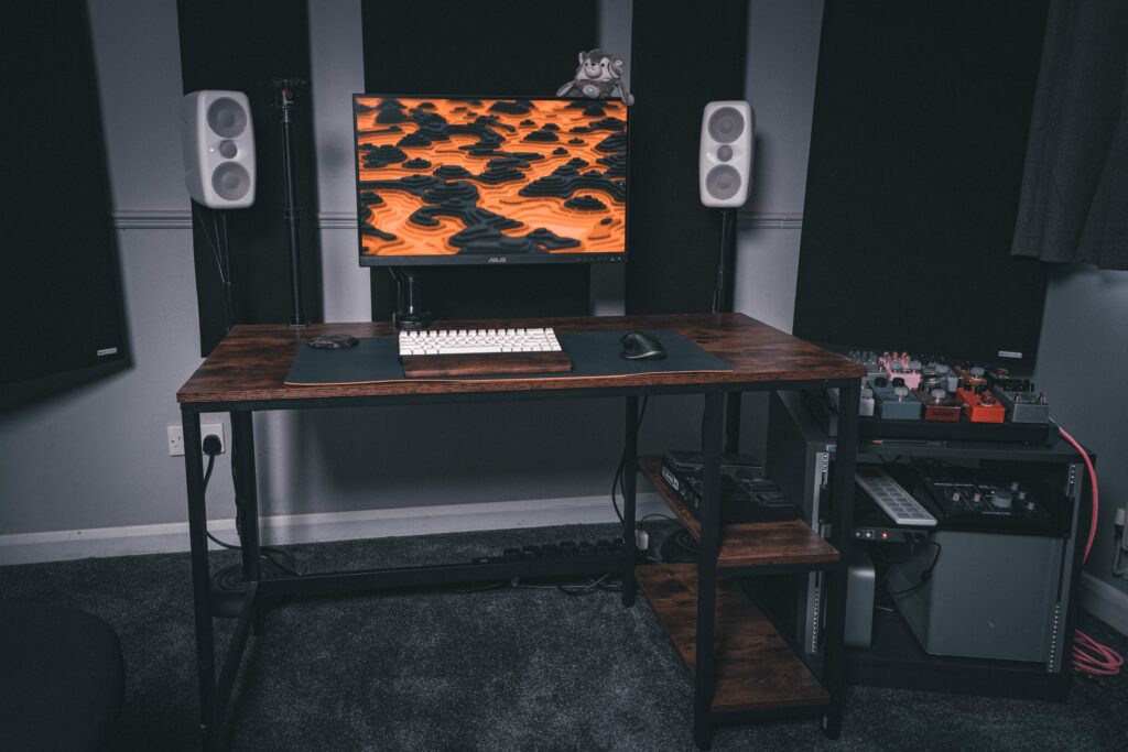 Just finished my triple computer music production setup!