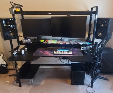 My modest gaming/programming/music mixing station. This is my very first office in my first house and I love it! Worked hard to get the audio balanced... Still lots of work to be done! And yes the desk is Ikea