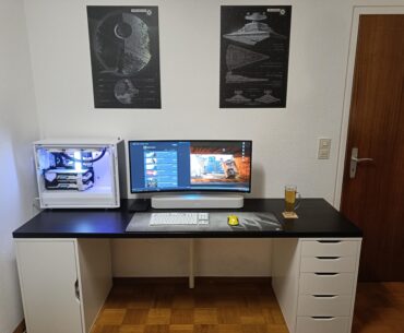 2020->Present : IKEA Desk, Displate Posters, Alienware Ultrawide, NVLink 2080 Super + Ryzen 9 3900X