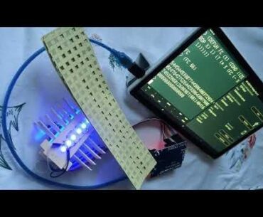 Self-made Arduino punch card reader used to run a Lisp program in the Cloud.