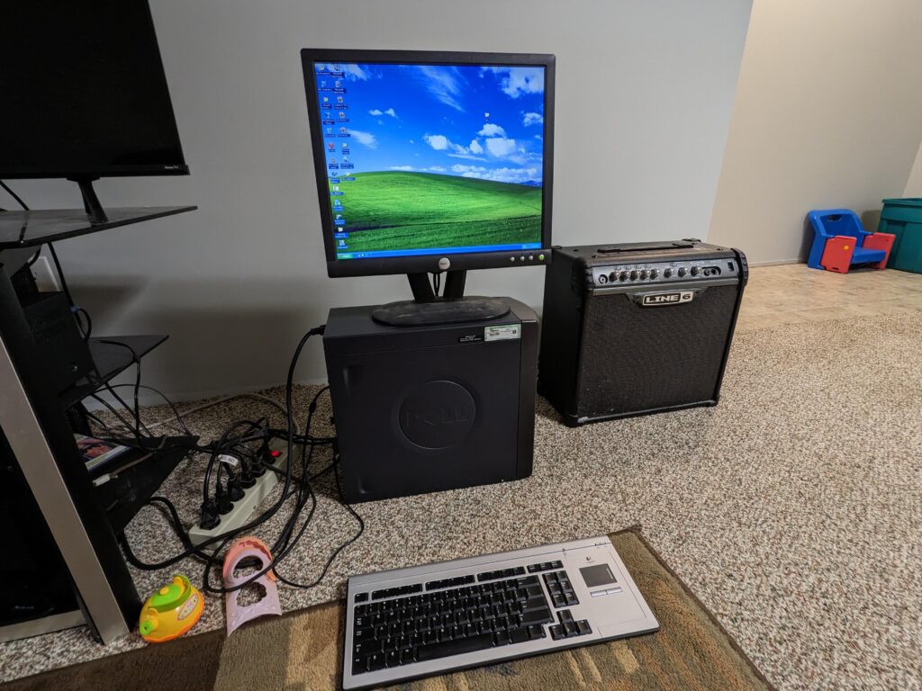Windows XP Home with one of those shitty trackpad keyboard combos