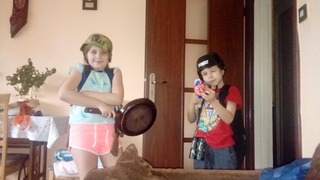 Kids do some cosplay. I wonder what game it is 🤔