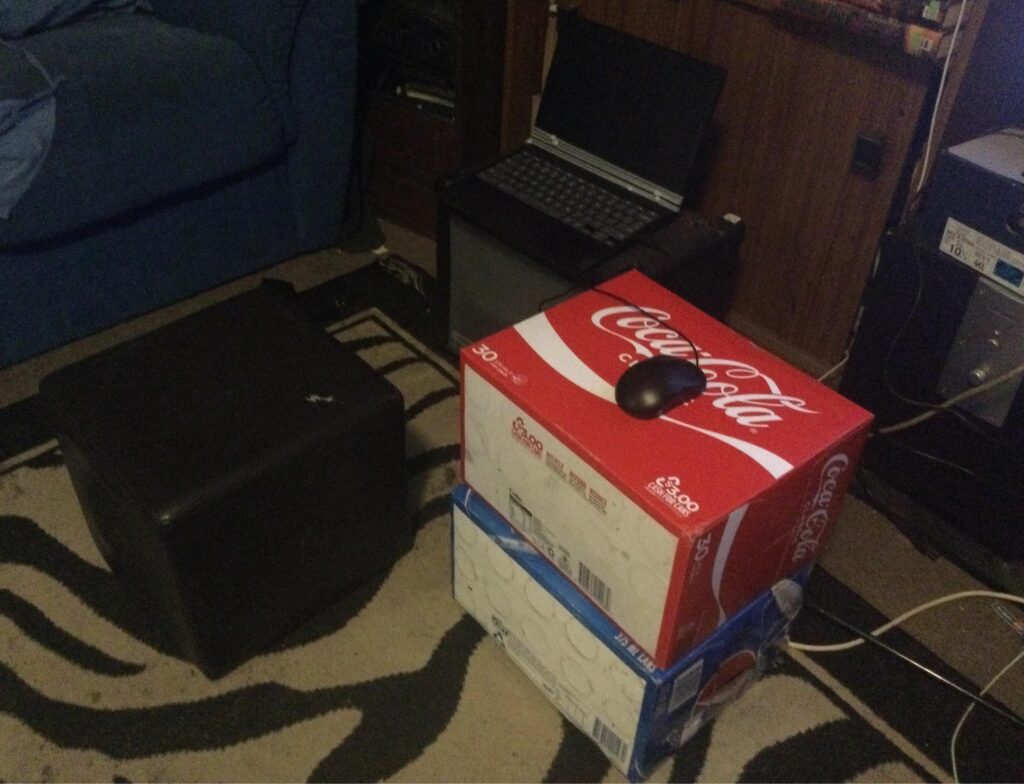 The laptop is a hand me down from my brother and front started coming off, and yes those are soda boxes