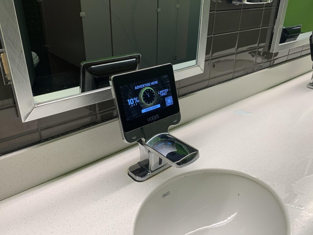 Advertisement screens on bathroom sinks at a movie theater in South Florida. Felt pretty cyberpunky.