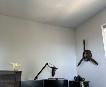 What should i put on the wall above the monitor?