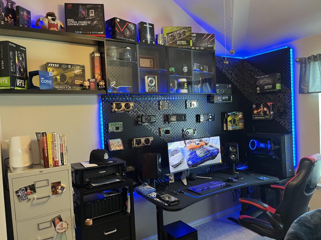 My dad’s battle station. He hung up a bunch of his video cards from over the years. The oldest being an old Voodoo card he got in the 90s.