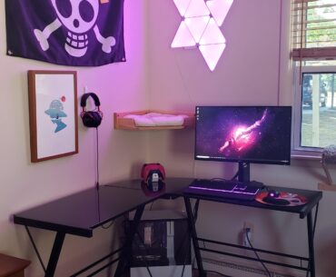My gaming corner (complete with hanging cat bed)