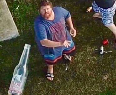 People throwing bottles at police drones that patrol over their property