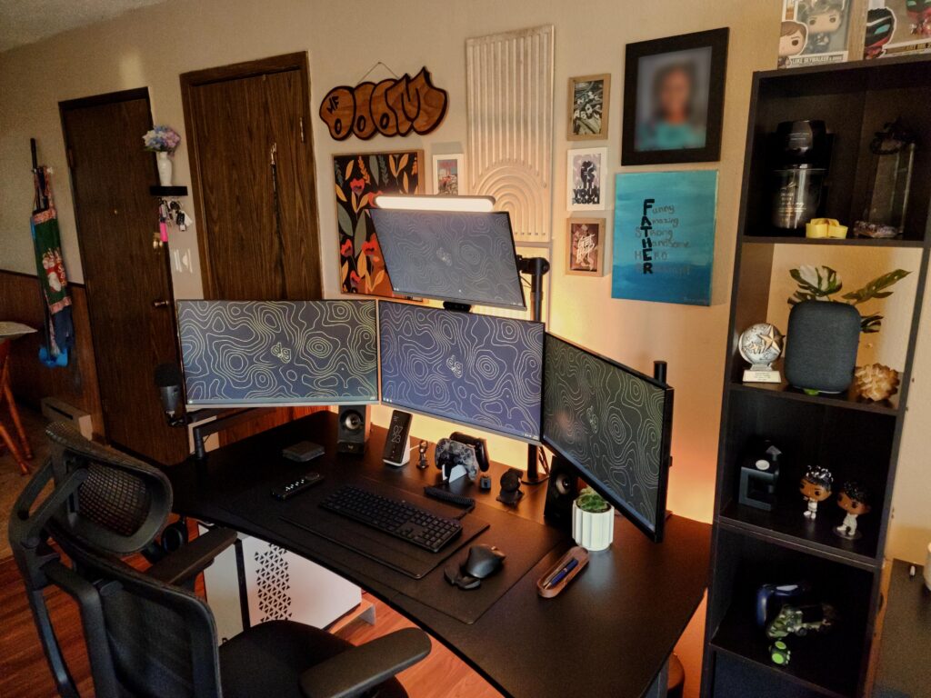 My desk setup in a small apartment with my wife. I work from home. I'm also a digital artist.