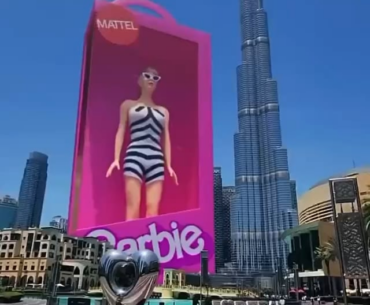 High tech Corpo promo “you will love Barbie” 3D ad in front of Burj Khalifa