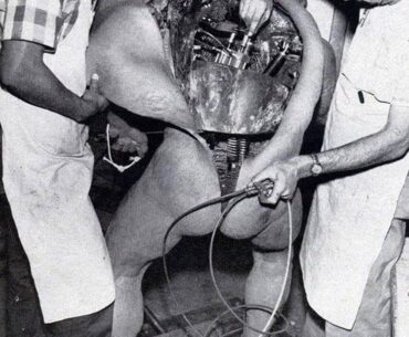 Disney technicians repairing an animatronic figure