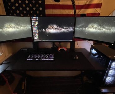 27” 1440p middle and two 1080p 21” monitors gaming setup.