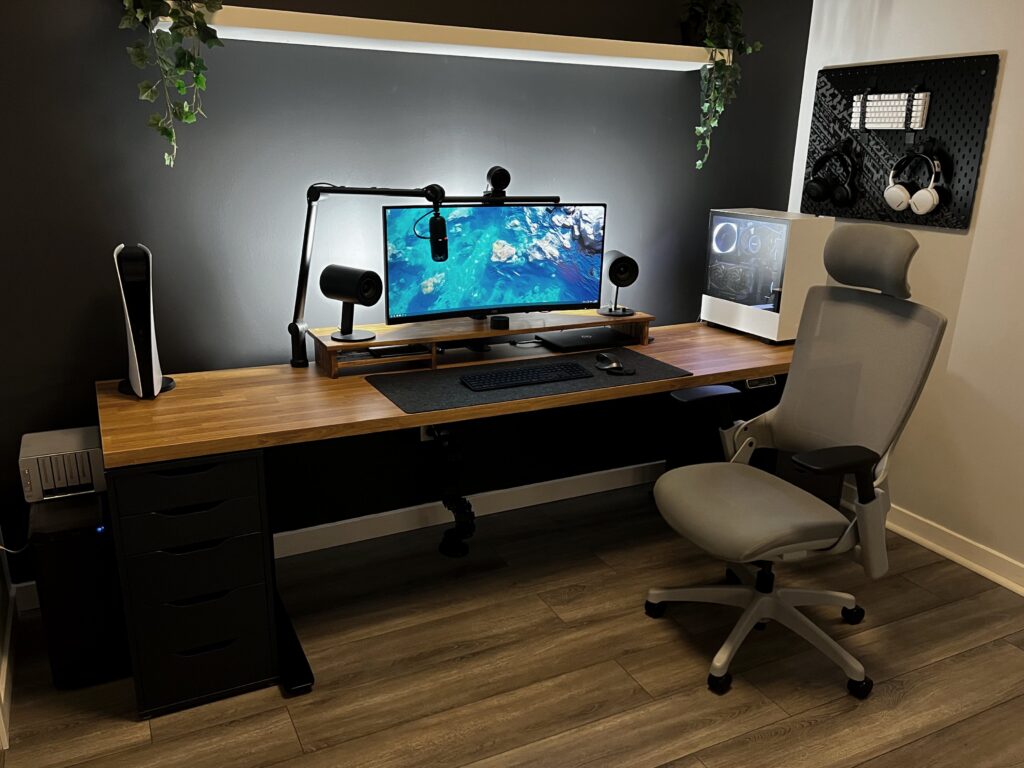 Newly Changed Setup - Added Standing Desk. Still a few pieces to come (art, rug, etc).
