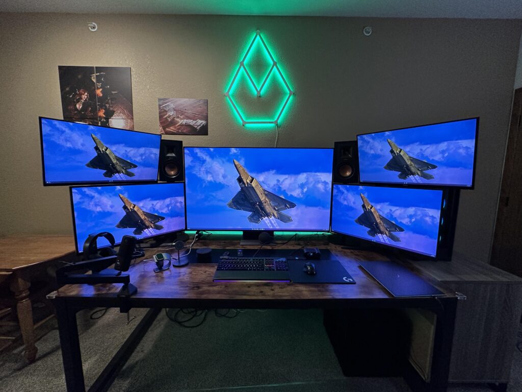 New space, new setup! Any thoughts on a wallpaper? Wondering if I could get one to span all monitors without NV Surround..