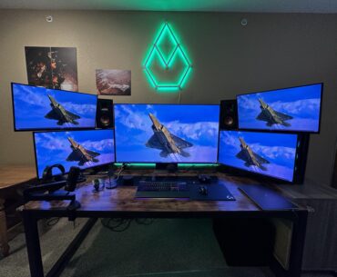 New space, new setup! Any thoughts on a wallpaper? Wondering if I could get one to span all monitors without NV Surround..