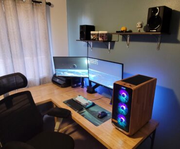 I custom built my desk out of butcher block, oiled and sealed it, and vinyl wrapped my tower.