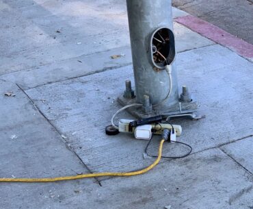 [XPost] Homeless stealing electricity from city pole in LA