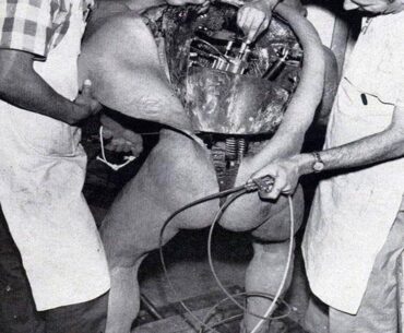 Disney technicians repairing an animatronic figure