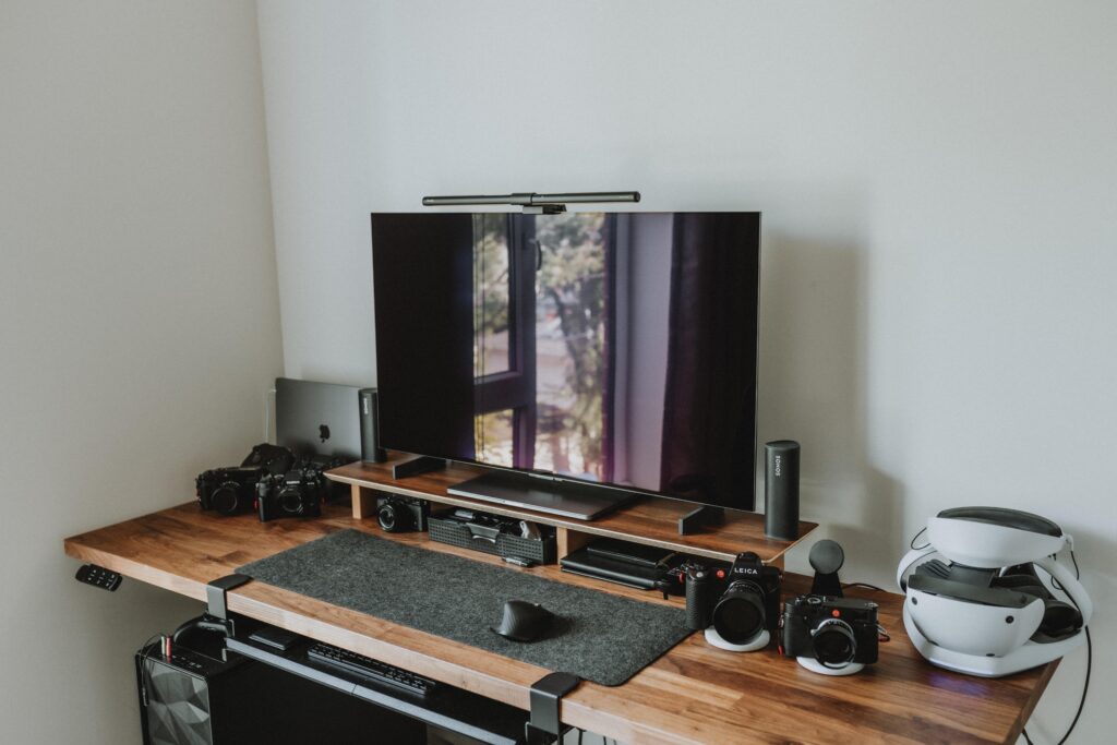 I'll be hanging three B&W Iceland photos I took behind the TV/Monitor! Would 16x20 do it or should I go smaller with the picture frames?