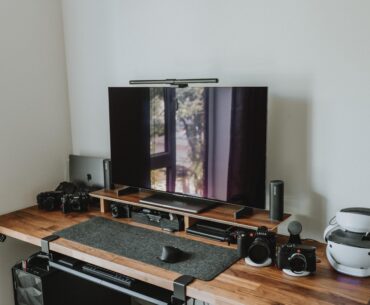 I'll be hanging three B&W Iceland photos I took behind the TV/Monitor! Would 16x20 do it or should I go smaller with the picture frames?