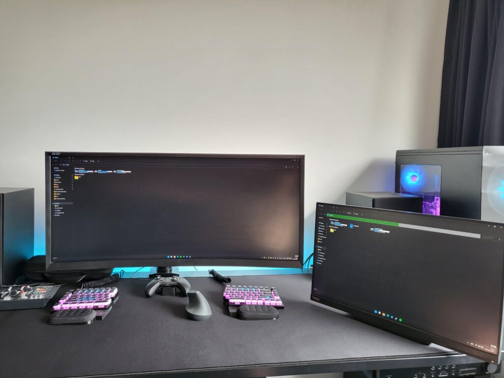 Main display is connected to my desktop for gaming. Second display is a touch screen connected to my Steam Deck for youtube. More details in comments.