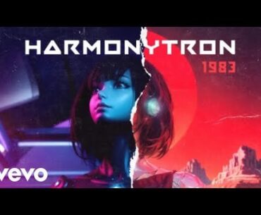 This transmission follows the galactic journey of Cindy, a cyber traveler awaiting her companion inside an orbital mothership, as portrayed in Harmonytron's new immersive cyberpunk-inspired video.