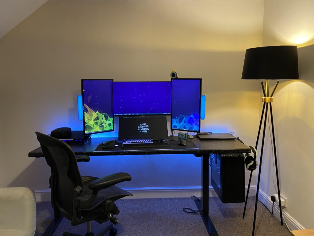 Quad monitor, triple workstation productivity setup