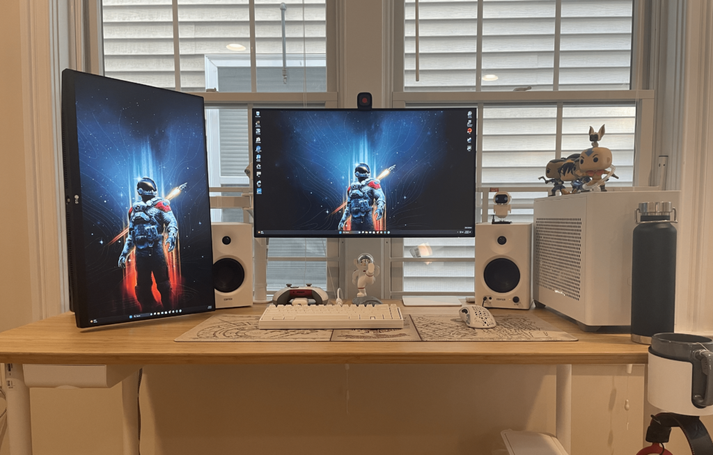 2 Monitors + 2 MacBooks + 1 PC + A pair of big speakers. Cable management was painful. More pics in comments.