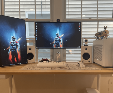 2 Monitors + 2 MacBooks + 1 PC + A pair of big speakers. Cable management was painful. More pics in comments.